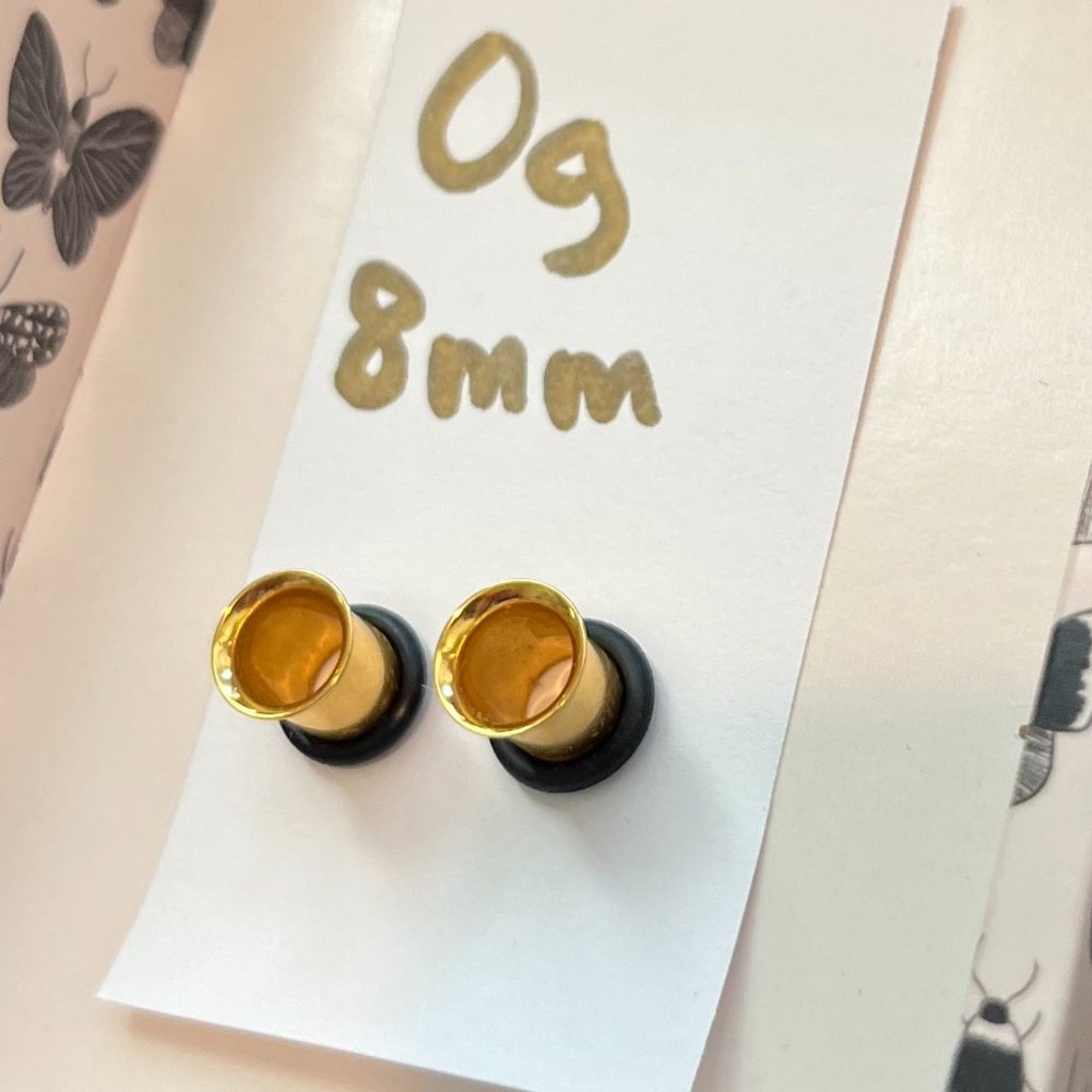 Single flared eyelet gold metal 0g 8mm, $10 when bundled